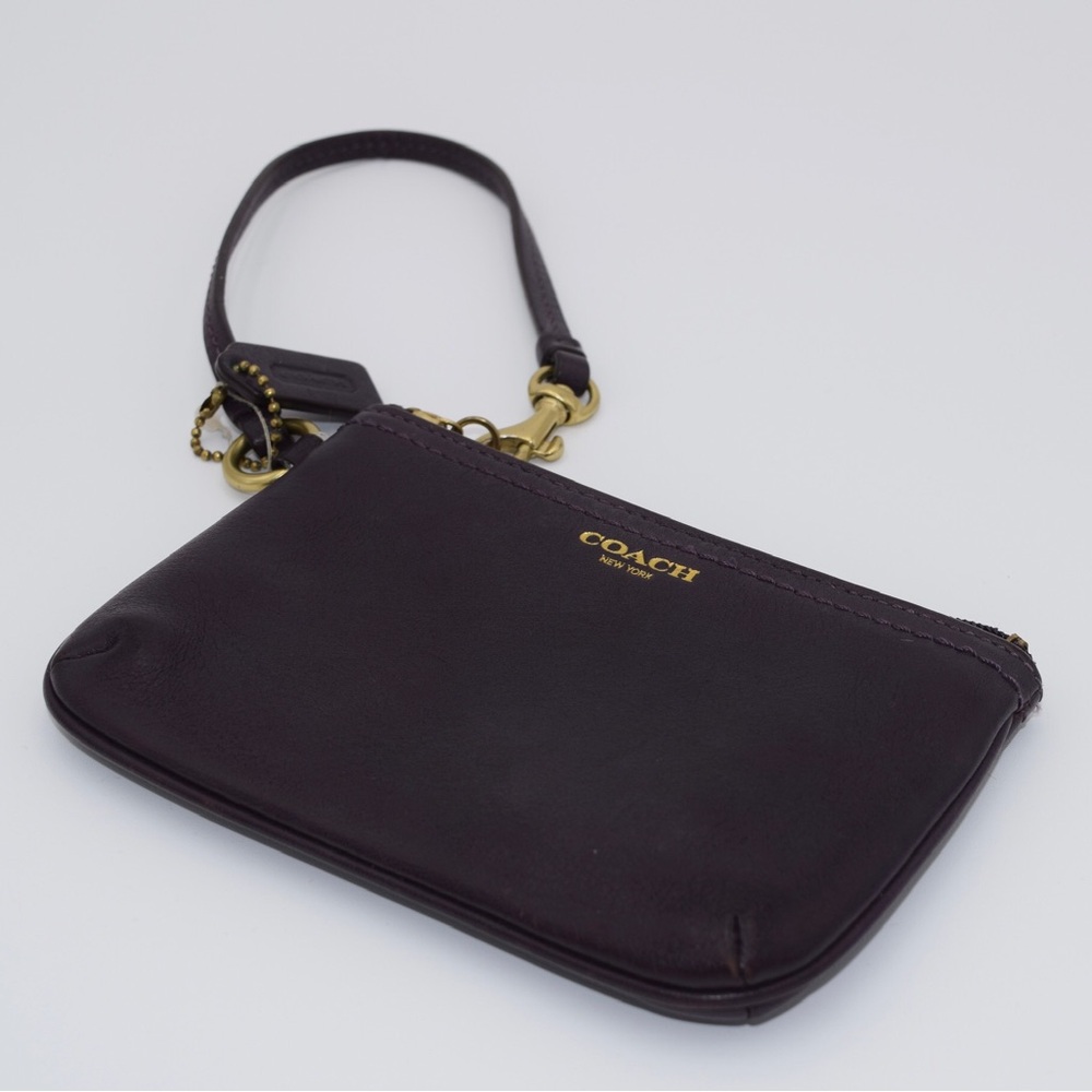 COACH WRISTLET IN EGGPLANT
